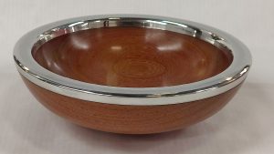 Turned wooden bowl with pewter rim by Paul Hannaby